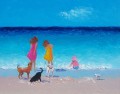 niñas y perros en la playa